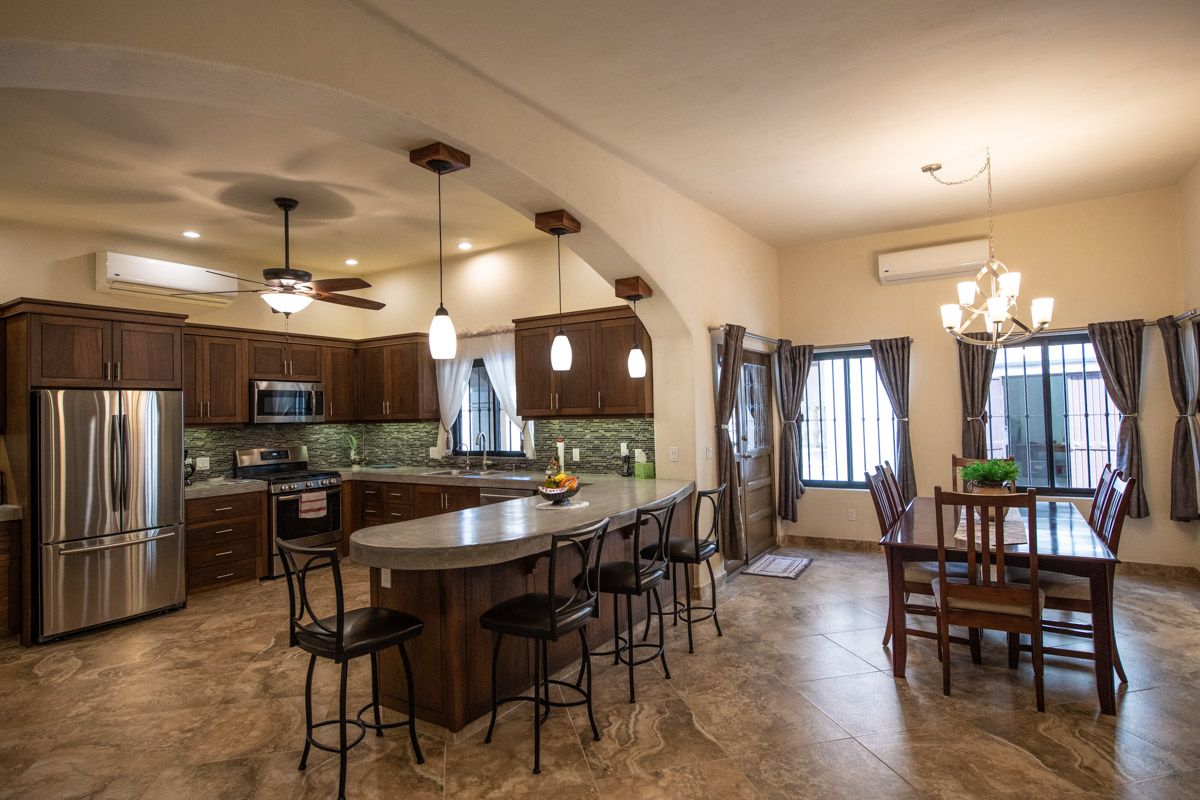 Fabulous One Level Home with Large Garage, Dipping Pool, Outdoor Kitchen and Bar Plus Guest House! Kitchen and dining