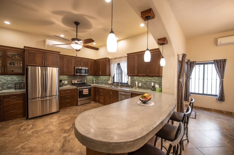 Fabulous One Level Home with Large Garage, Dipping Pool, Outdoor Kitchen and Bar Plus Guest House! Kitchen island